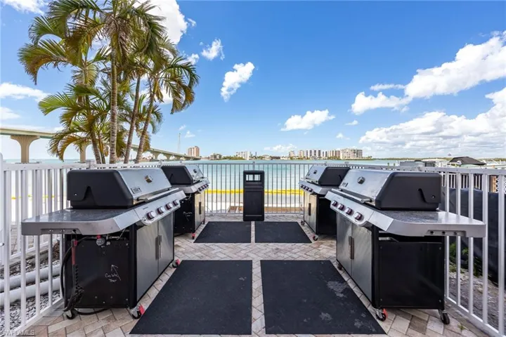 Outdoor grilling area with water views