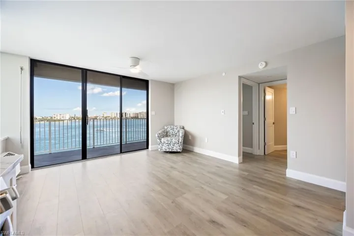 Living space filled with natural light and expansive water views