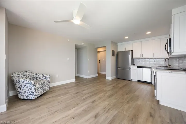 Spacious living area with luxury vinyl plank flooring throughout