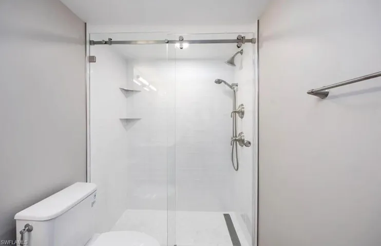 Modern bathroom featuring sleek tile and updated fixtures