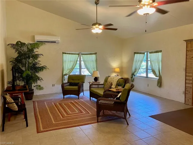 The living room is very large and offers great space to hang out in.