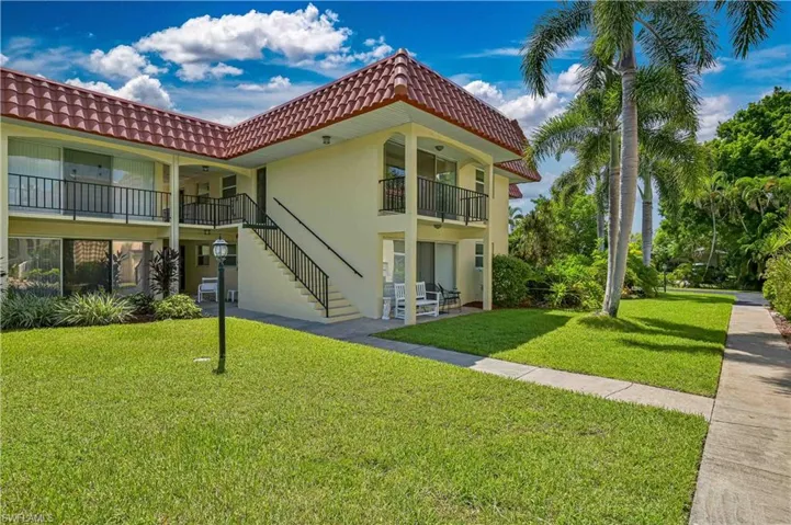Beautifully maintained 55+ community surrounded by lush tropical landscaping, swaying palms and inviting walkways for a relaxed Florida lifestyle.