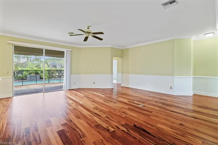 Bedroom featuring carpet flooring, a closet, and ceiling fan