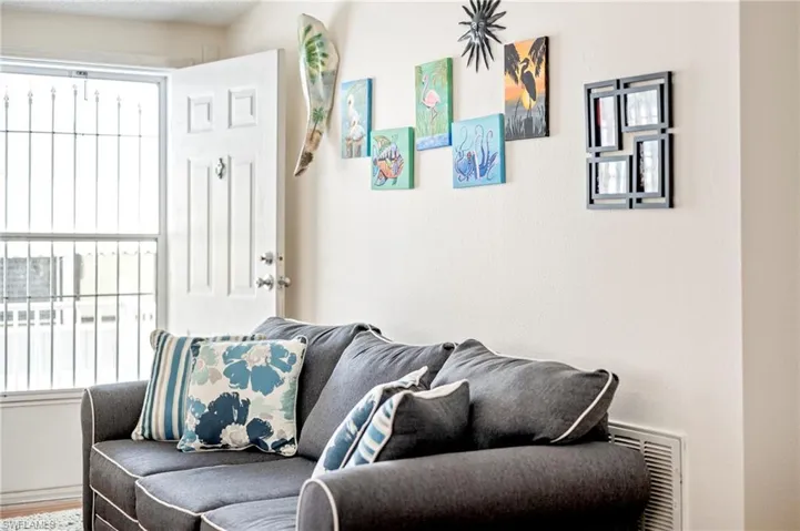Living room featuring visible vents