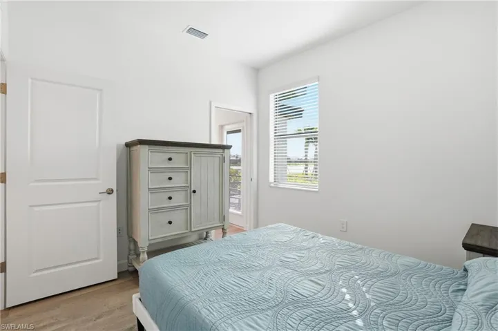 Bedroom with light wood-style flooring