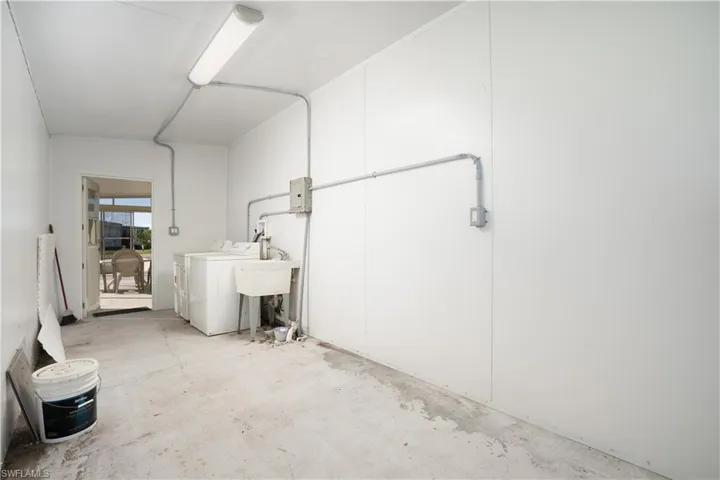 Basement with washer and dryer