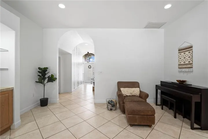 Sitting room featuring light tile patterned floors