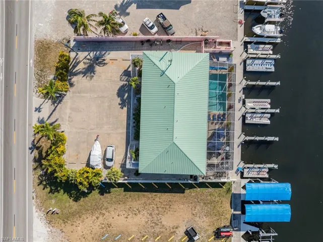 Drone / aerial view of a marina and a large body of water