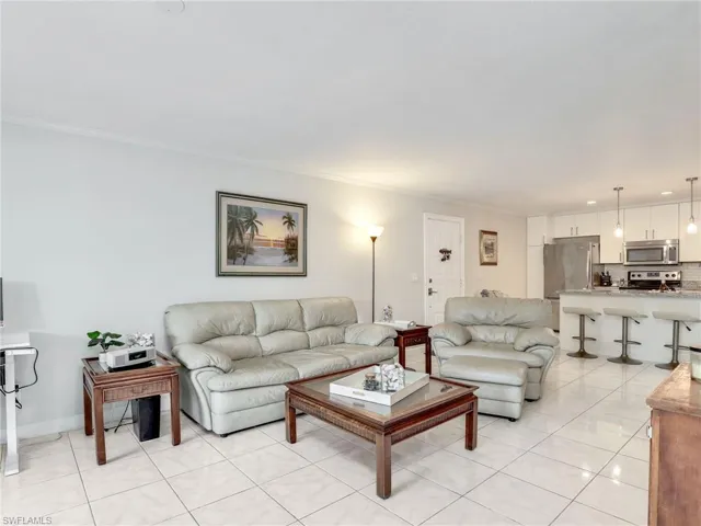 Tiled living room with ornamental molding