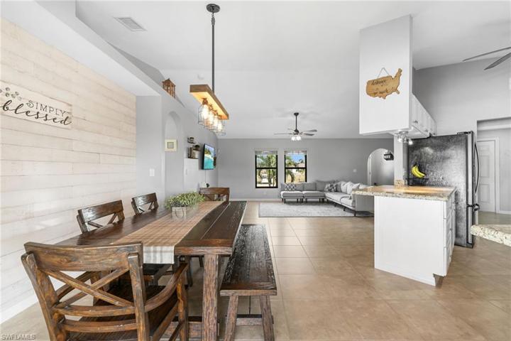 Wonderful flow with open wall between the kitchen and dining area while maintaining extra cabinet space.