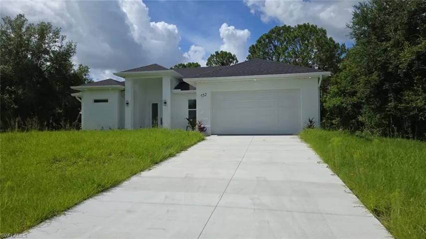 Ranch-style house with a garage