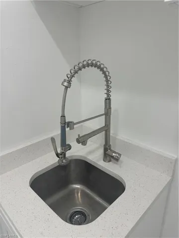 Interior details with light stone counters and sink