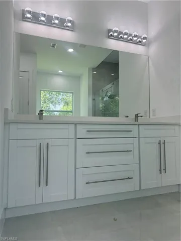 Bathroom featuring vanity