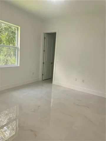 View of tiled empty room