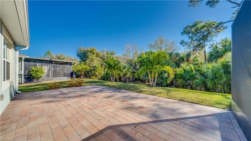 View of patio / terrace featuring a sunroom