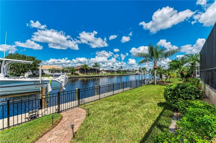 Water view featuring a dock