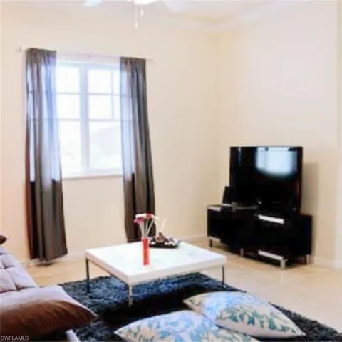 Room with neutral wall tones and light-toned flooring