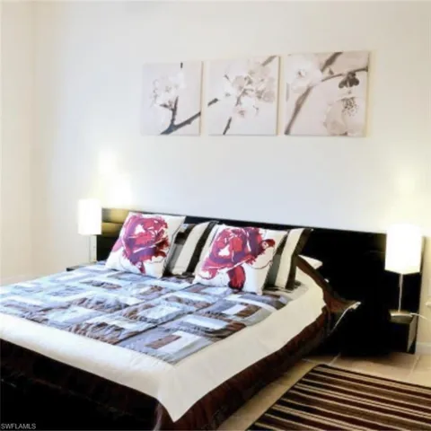 Integrated headboard with side tables and built-in lighting