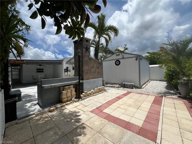 View of yard featuring a gate