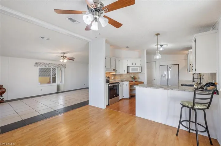 Dining area with wood flooring