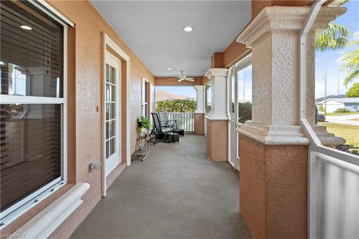 Porch featuring a ceiling fan
