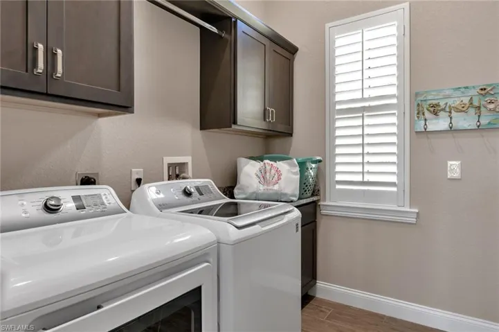 A wealth of natural. Full size Washer & Dryer, cabinets