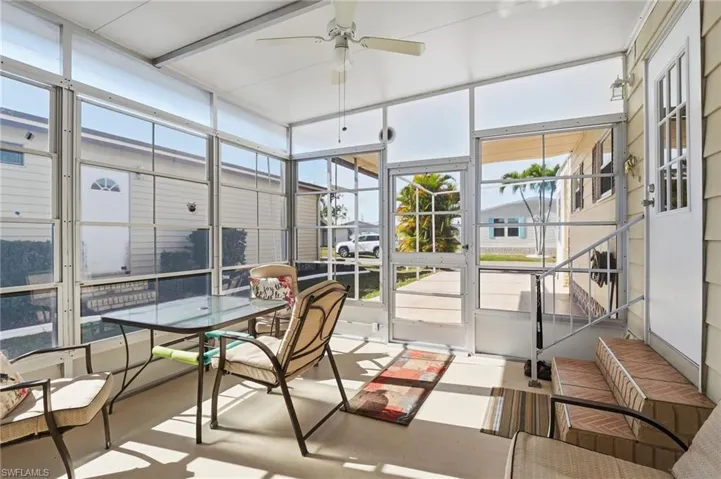 Screened Sunroom with Ceiling Fan and Window