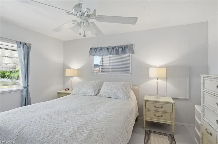 Second Bedroom featuring ceiling fan and multiple windows