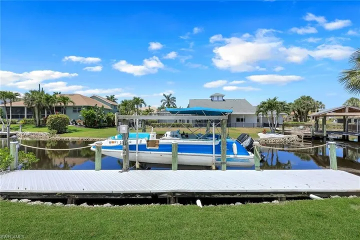 Home features a 7,000 pound boat lift.