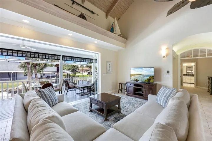 Sliding doors adjoin indoor/outdoor living spaces.