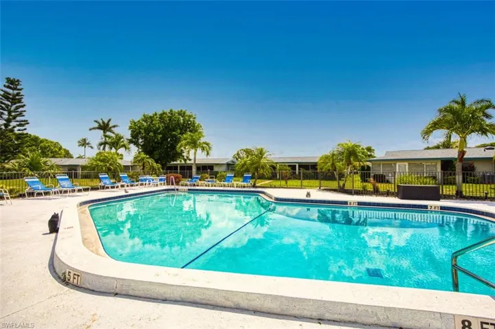 Community pool featuring a patio area