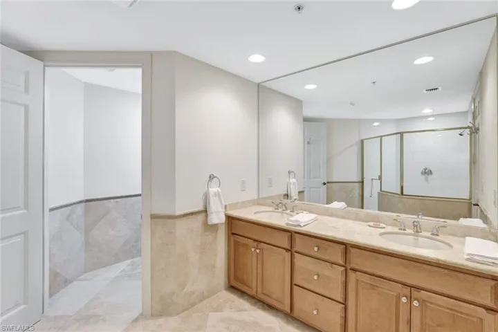Guest bathroom with double marble-top vanity