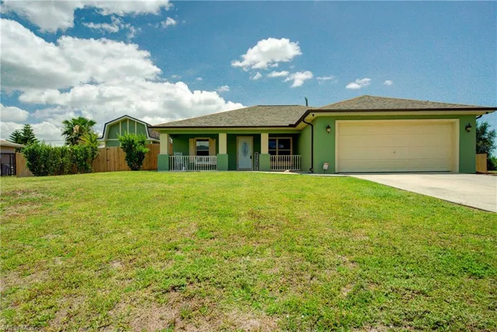 Welcome home to a well cared for property in NE Cape Coral