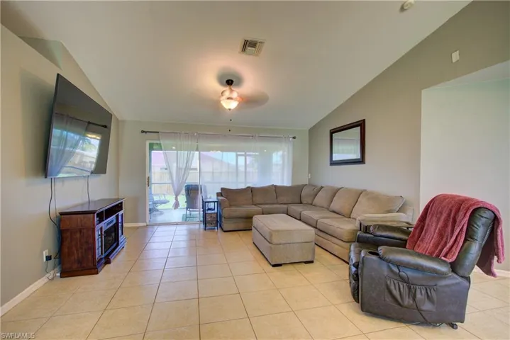 A large living room space at 15' x 14'