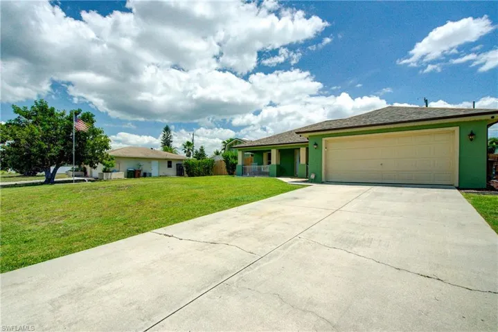 A two car garage and a big driveway provide ample parking