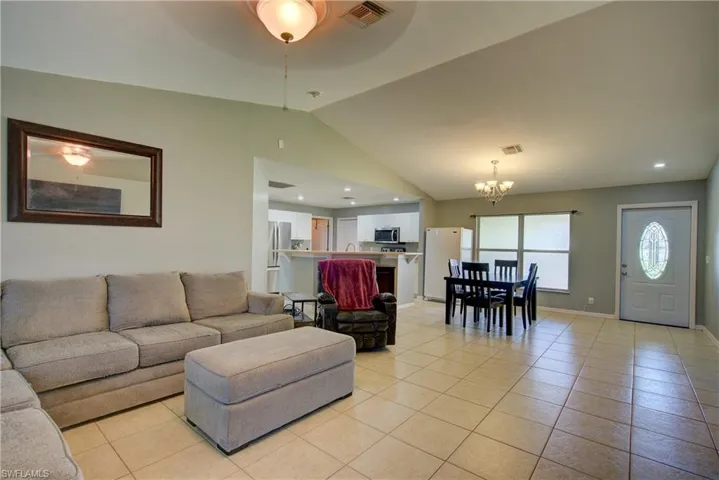 Vaulted ceilings welcome you in this Great Room when you enter