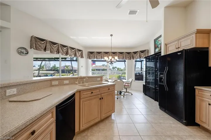 Spacious kitchen with Whirlpool appliances and brand new dishwasher