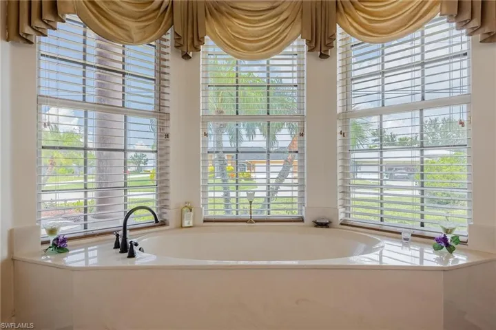 Soaking Tub for those long stressful days with a lovely view of the front yard.