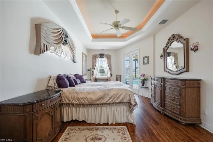 Master Bedroom with Tray Ceiling Lighting