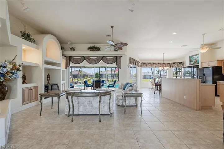 View of living room and kitchen as you enter