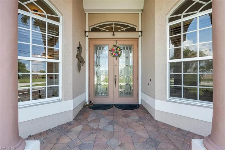 Entry Way with Impact Windows and Electric Shutter for Front Door.