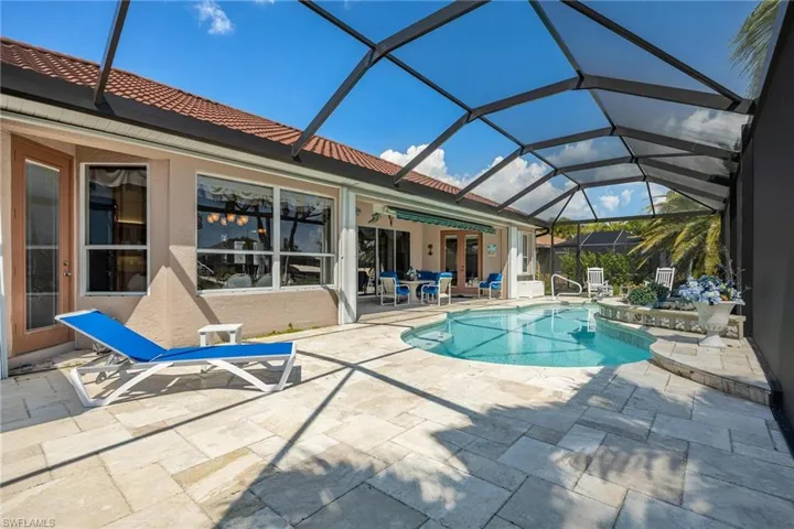 Pool and back of house view from the far left corner of the lanai.