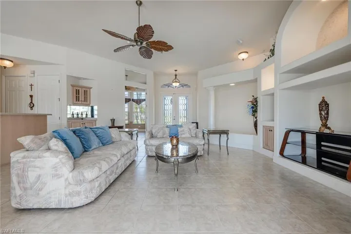 View of living room and entryway from Sliders