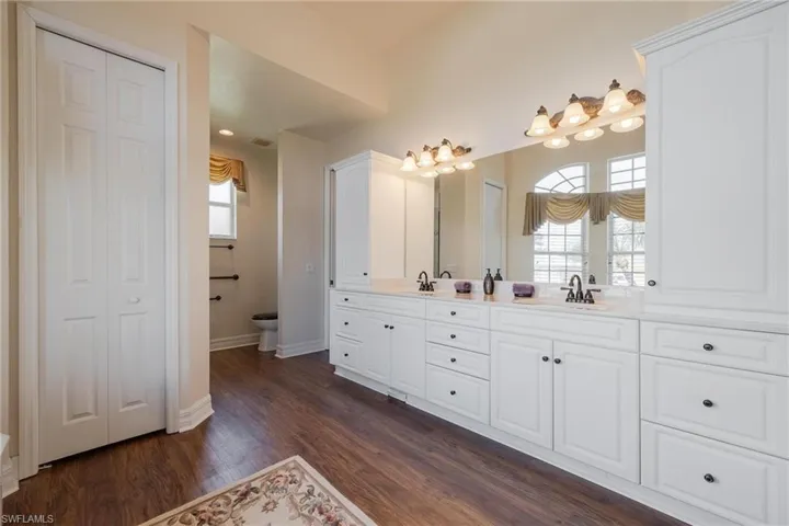 Updated Master Bath with custom cabinetry and access to central vac.