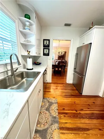 Kitchen with white cabinets