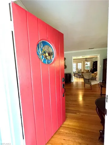 Entryway with original front door