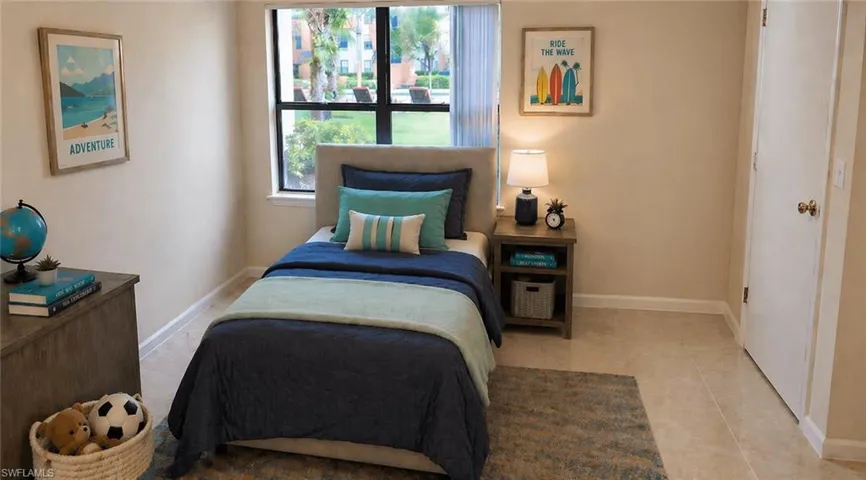 Bedroom featuring light-toned walls and tile flooring