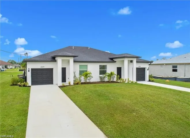 717/719 Gordon Ave S, Lehigh Acres, Florida 33973