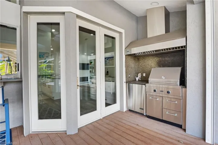 Here's your outdoor grill and fridge when you bring the party poolside