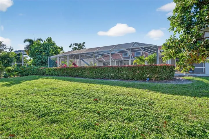 The large backyard offers privacy and is situated on the Nest Golf Course